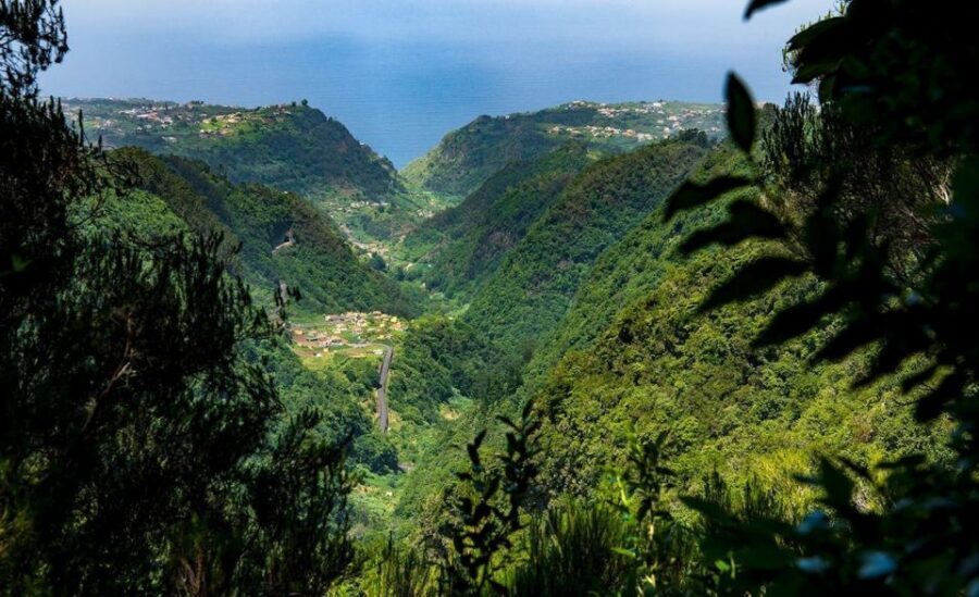 Queimadas Caldeirao Verde Full day hike - Passing the Waterfall’s Lead-In: Narrow Paths and Short Tunnels